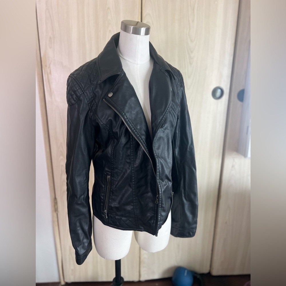 Celebrity pink black faux leather jacket